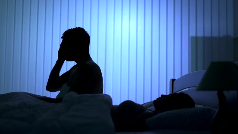 The man with a nightmare wake up near the woman